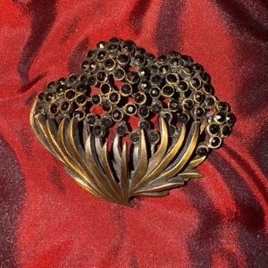 Elegant Black and Brassy Gold Floral Brooch